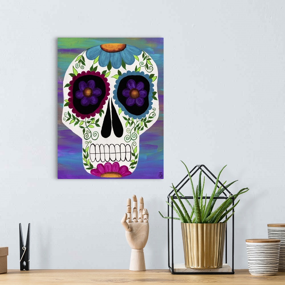 A bohemian room featuring Painting of a decorative sugar skull, celebrating the Day of the Dead.