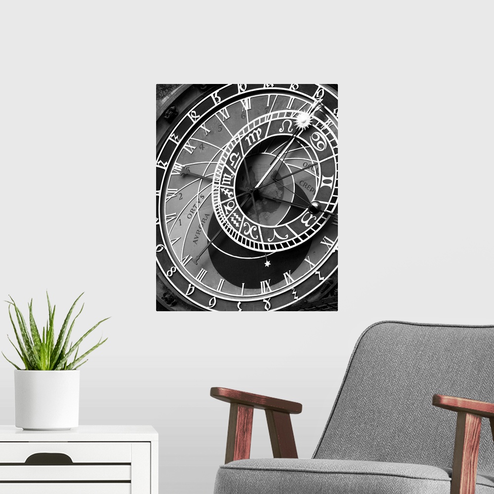 A modern room featuring zodiac, clock, architectural, black and white photograph