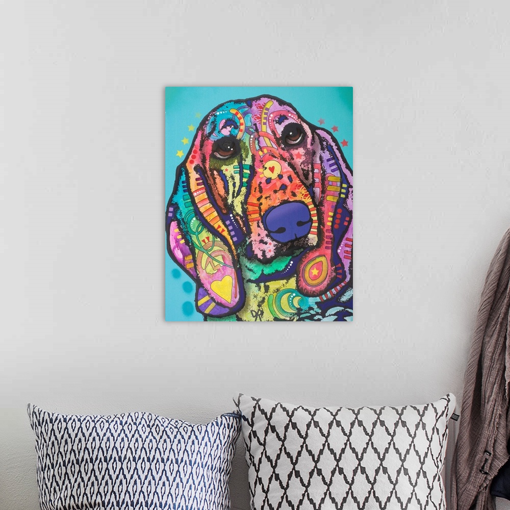 A bohemian room featuring Colorful artwork of a hound dog with graffiti-like designs on a light blue background.