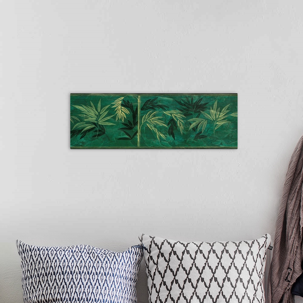 A bohemian room featuring Artwork of bamboo in green.