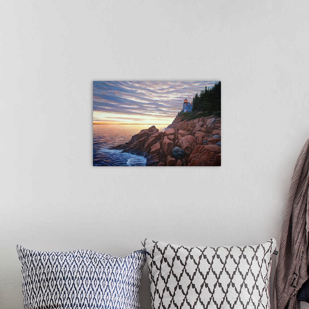 A bohemian room featuring Contemporary artwork of a view of a rocky sea coast at sunset.