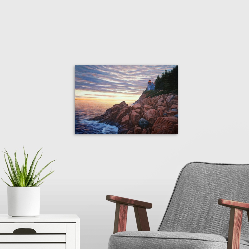 A modern room featuring Contemporary artwork of a view of a rocky sea coast at sunset.