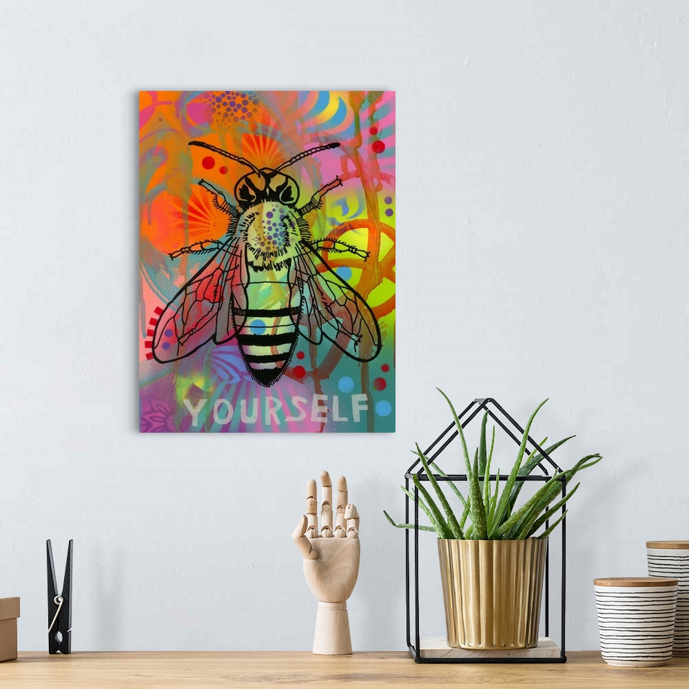 A bohemian room featuring Black illustration of a bee on a colorful graffiti style background with "Yourself" written under...