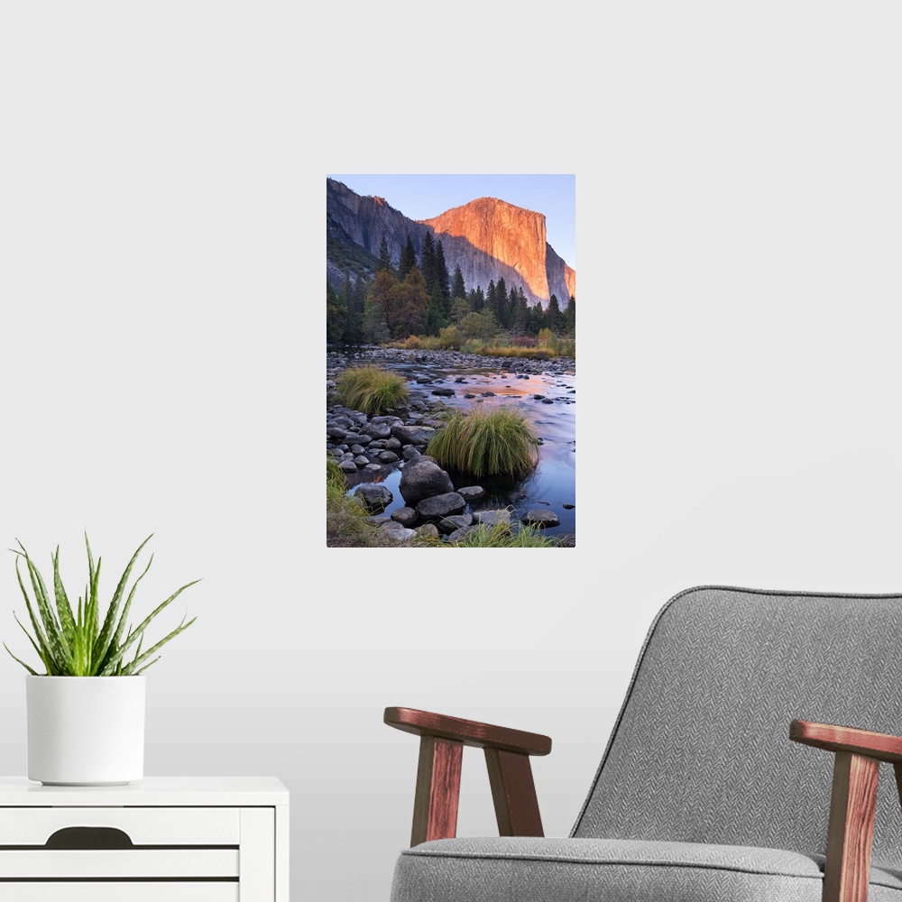 A modern room featuring Warm sunlight hitting El Capitan at dusk over the River Merced in Yosemite.