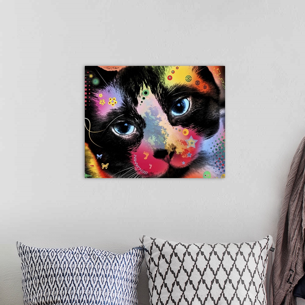 A bohemian room featuring Contemporary artwork of a cat colored in an array of bright and vibrant colors.