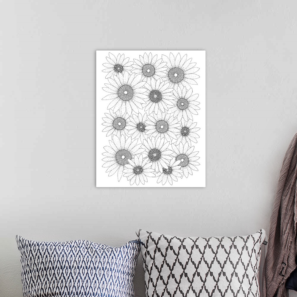A bohemian room featuring Black and white line art of sunflowers.