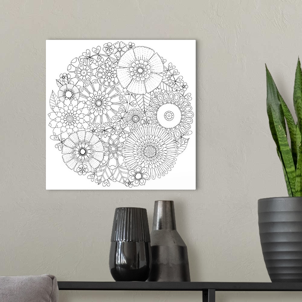 A modern room featuring Black and white line art of intricately designed flowers that create a circular shape.
