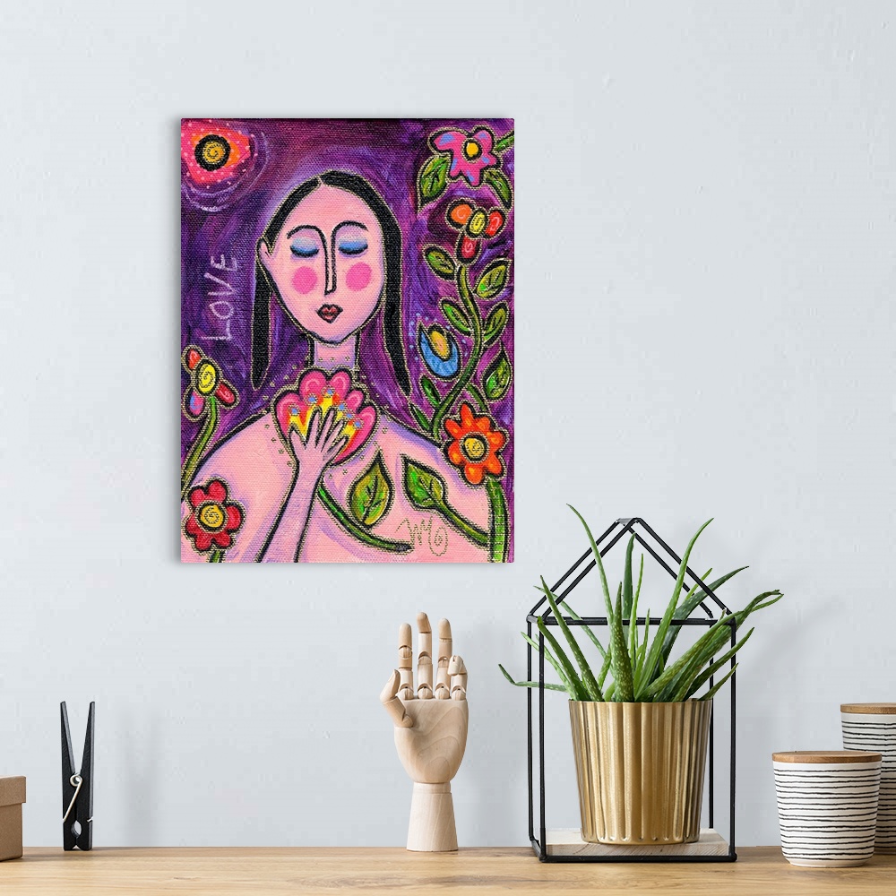 A bohemian room featuring A pink woman holding and surrounded by flowers.