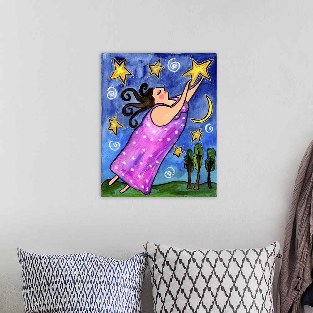 A bohemian room featuring A woman in pink raising her arms toward the stars in the sky.