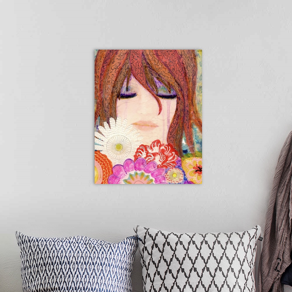 A bohemian room featuring A girl holding a bouquet of flowers near her face.