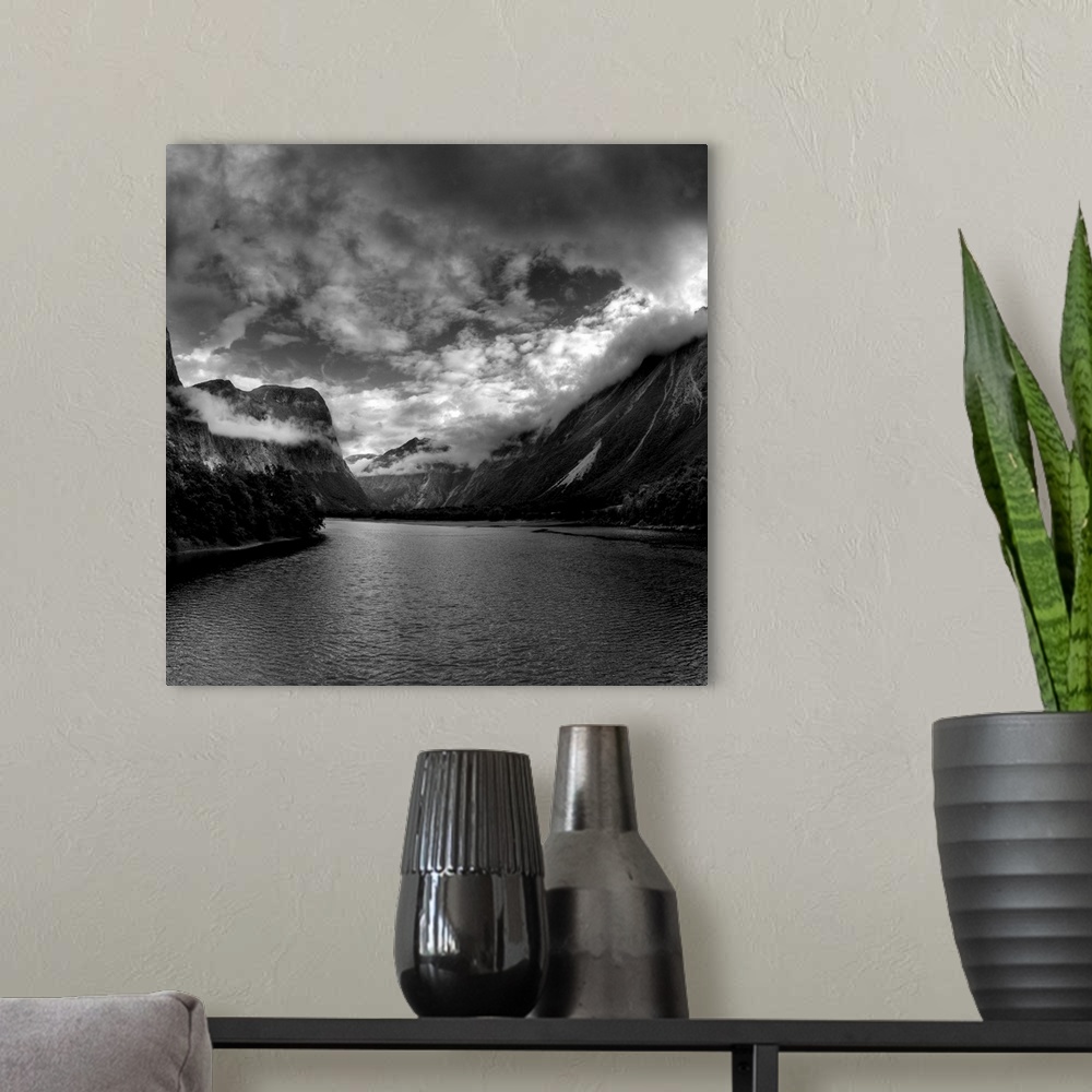 A modern room featuring Black and White Photo of mountains and wilderness