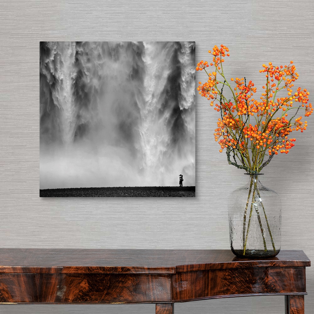 A traditional room featuring Black and White Photo of waterfall with person