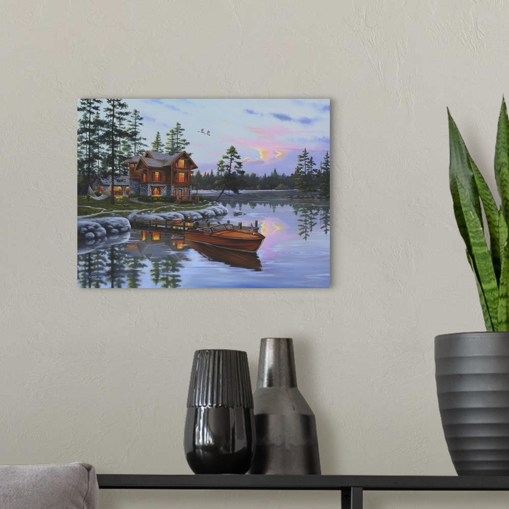 A modern room featuring An idyllic painting of a wilderness scene of a cabin on a lake.