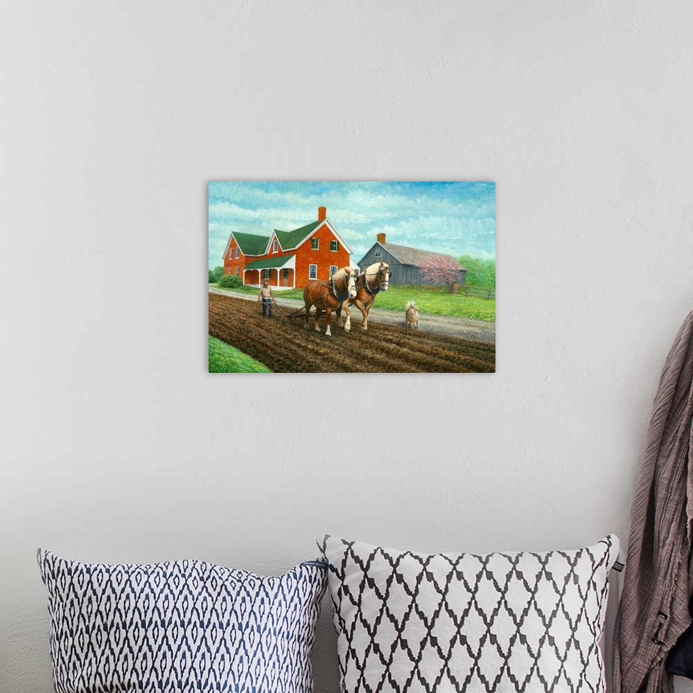 A bohemian room featuring Contemporary artwork of two horses pulling a plow in a field.