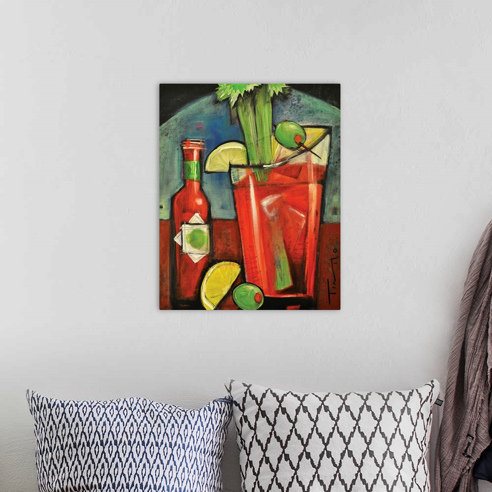A bohemian room featuring Painting of alcoholic beverage garnished with celery, olives, and lemons next to a bottle of mix.