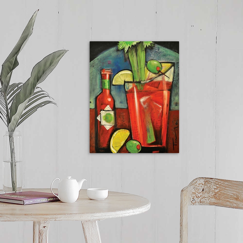A farmhouse room featuring Painting of alcoholic beverage garnished with celery, olives, and lemons next to a bottle of mix.