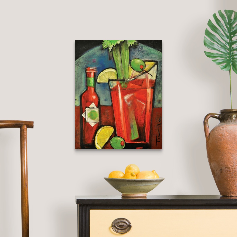 A traditional room featuring Painting of alcoholic beverage garnished with celery, olives, and lemons next to a bottle of mix.