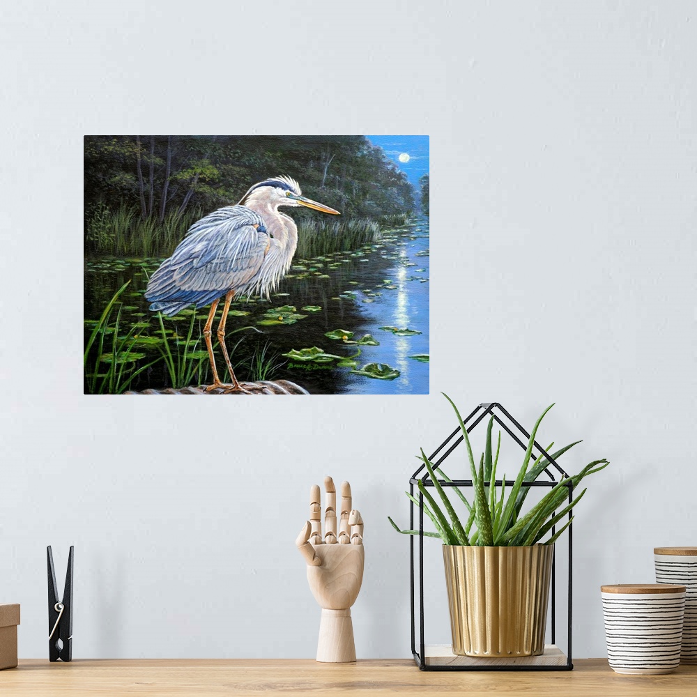A bohemian room featuring Painting of a Great Blue Heron standing on the edge of a pond with moonlight reflecting off the w...