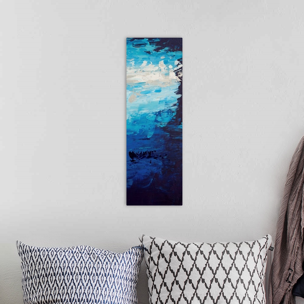 A bohemian room featuring Contemporary abstract painting in blue tones, resembling a bright sky.