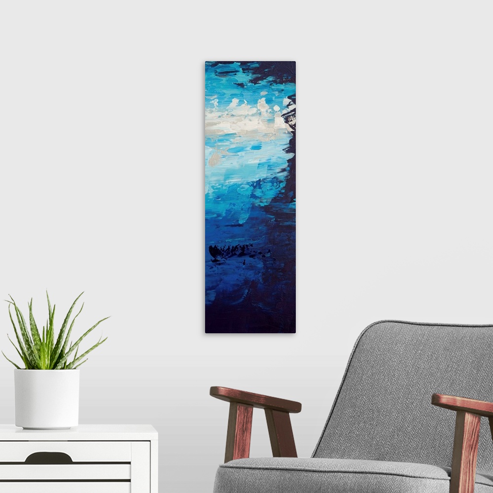 A modern room featuring Contemporary abstract painting in blue tones, resembling a bright sky.