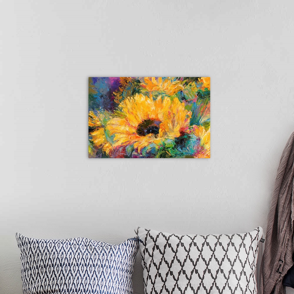 A bohemian room featuring Colorful abstract painting of sunflowers.