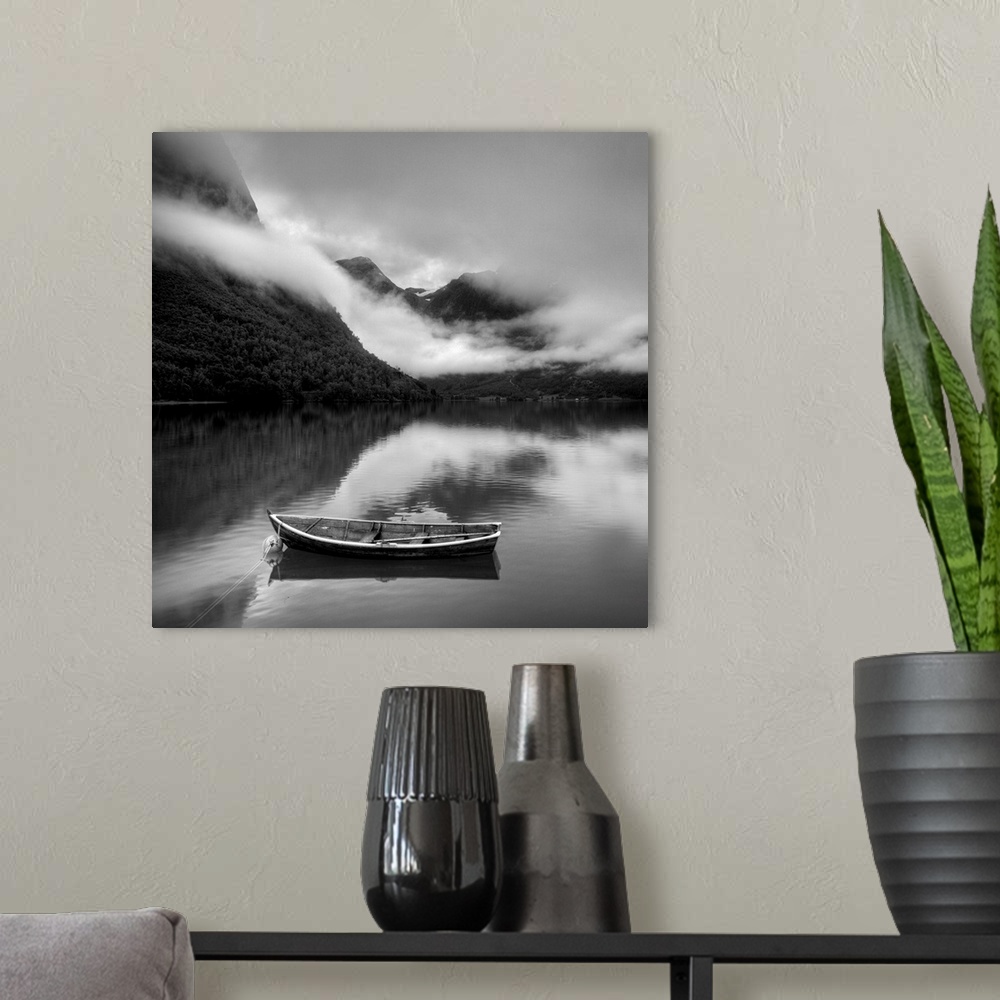 A modern room featuring Boat surrounded by foggy mountains