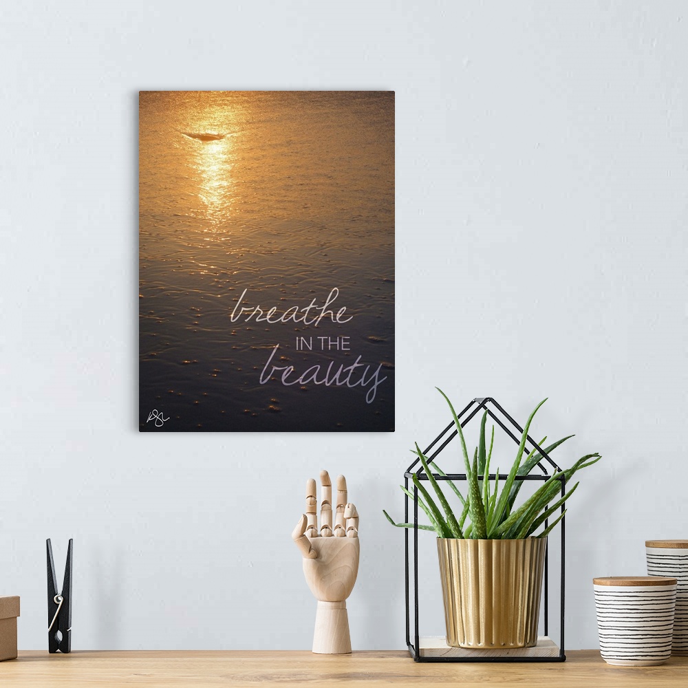 A bohemian room featuring Motivational text against background photograph of a seascape.