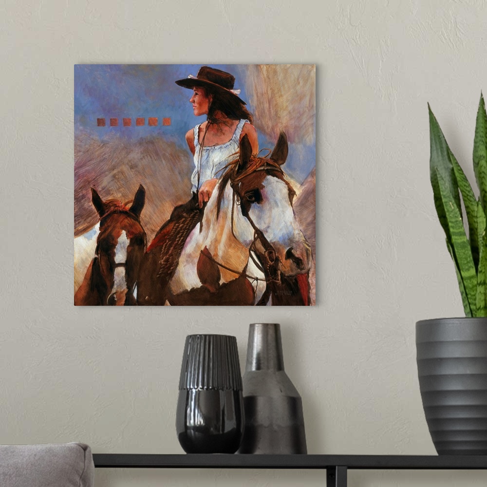 A modern room featuring Western themed contemporary painting of a cowgirl on horseback.