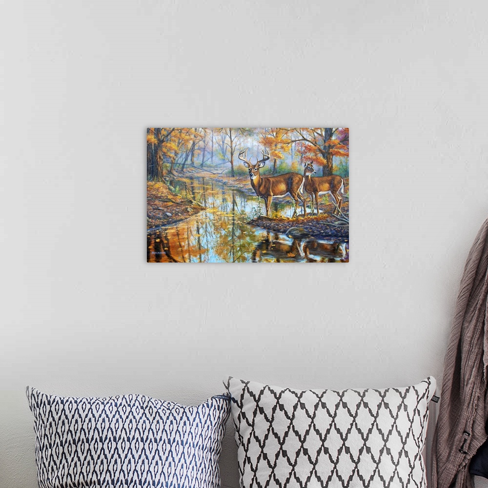 A bohemian room featuring Contemporary artwork of two white-tailed deer on the edge of a stream.