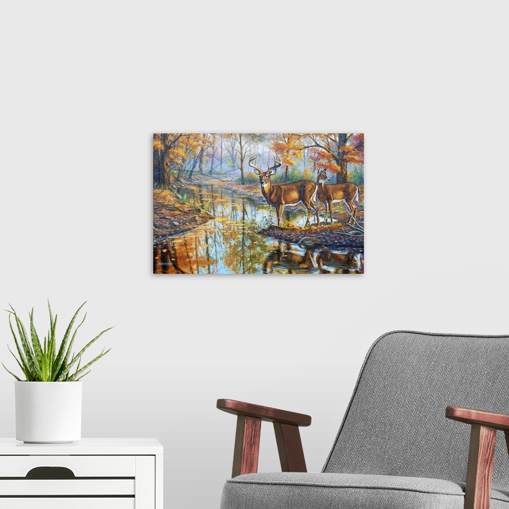 A modern room featuring Contemporary artwork of two white-tailed deer on the edge of a stream.