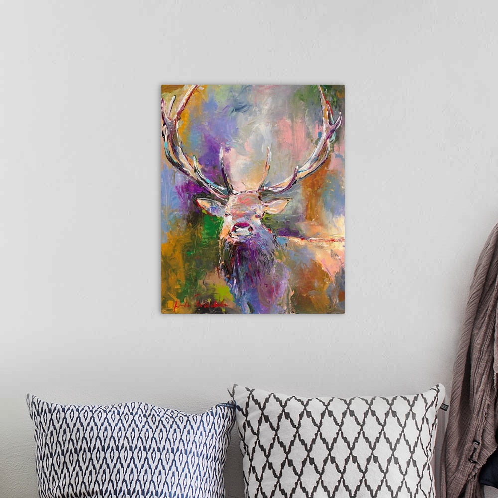 A bohemian room featuring Colorful abstract painting of a male deer with large antlers.