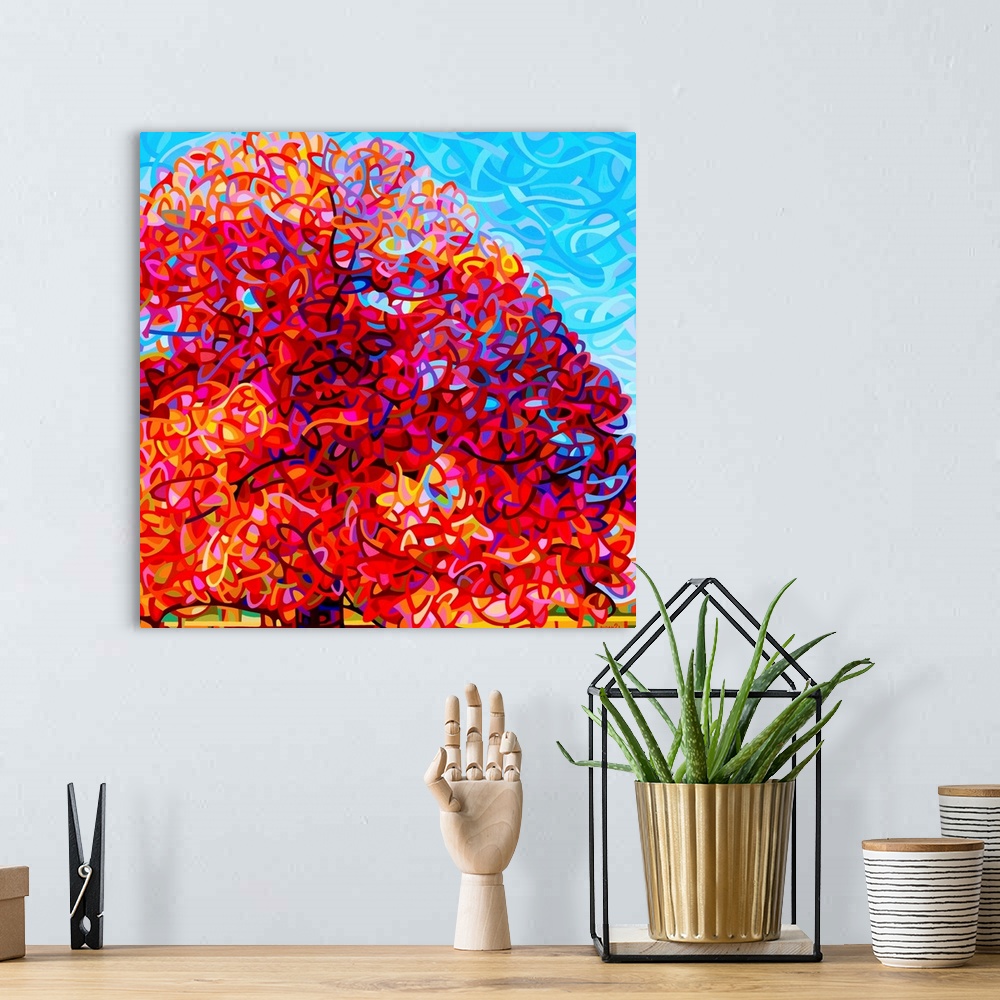 A bohemian room featuring Contemporary artwork of a large stylized tree with bright red leaves.