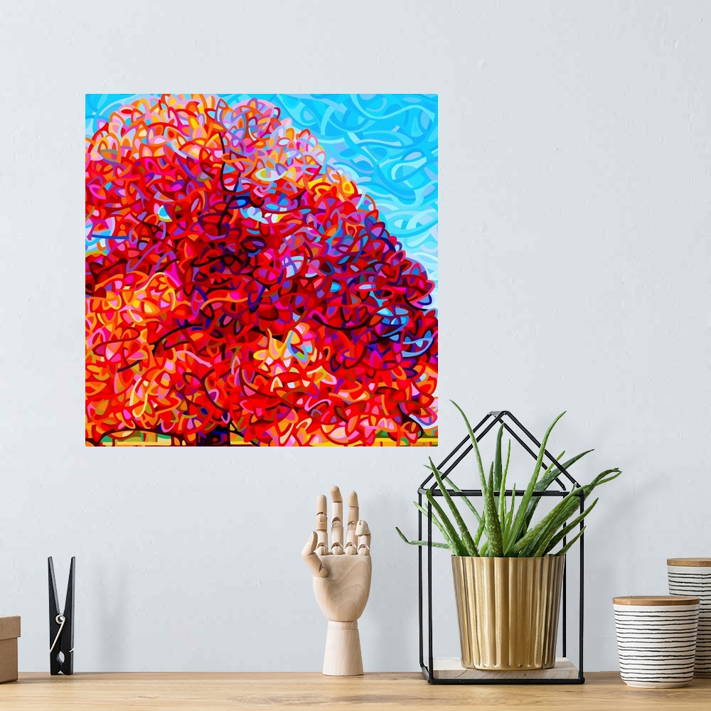 A bohemian room featuring Contemporary artwork of a large stylized tree with bright red leaves.