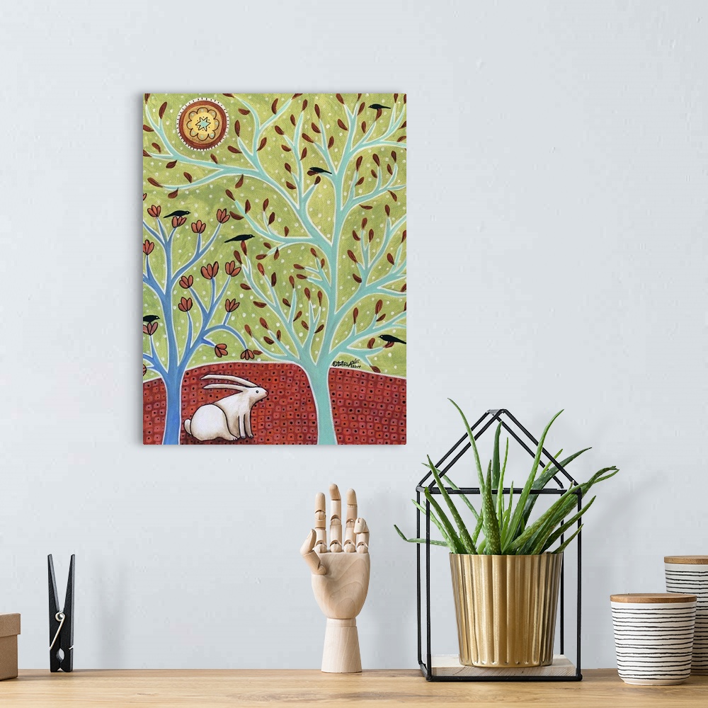 A bohemian room featuring Contemporary painting of a white rabbit in a forest.