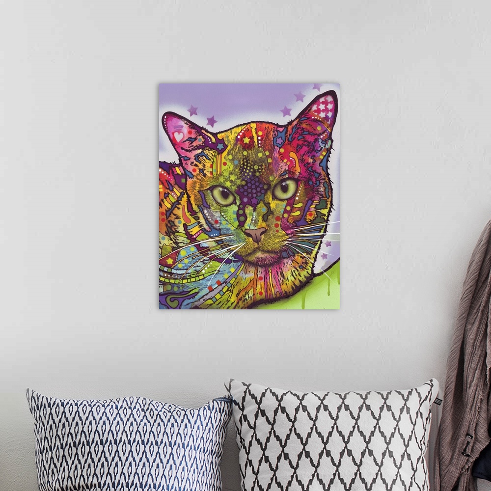 A bohemian room featuring Contemporary artwork of a cat's outline filled with several multicolored patterns arranged in a g...
