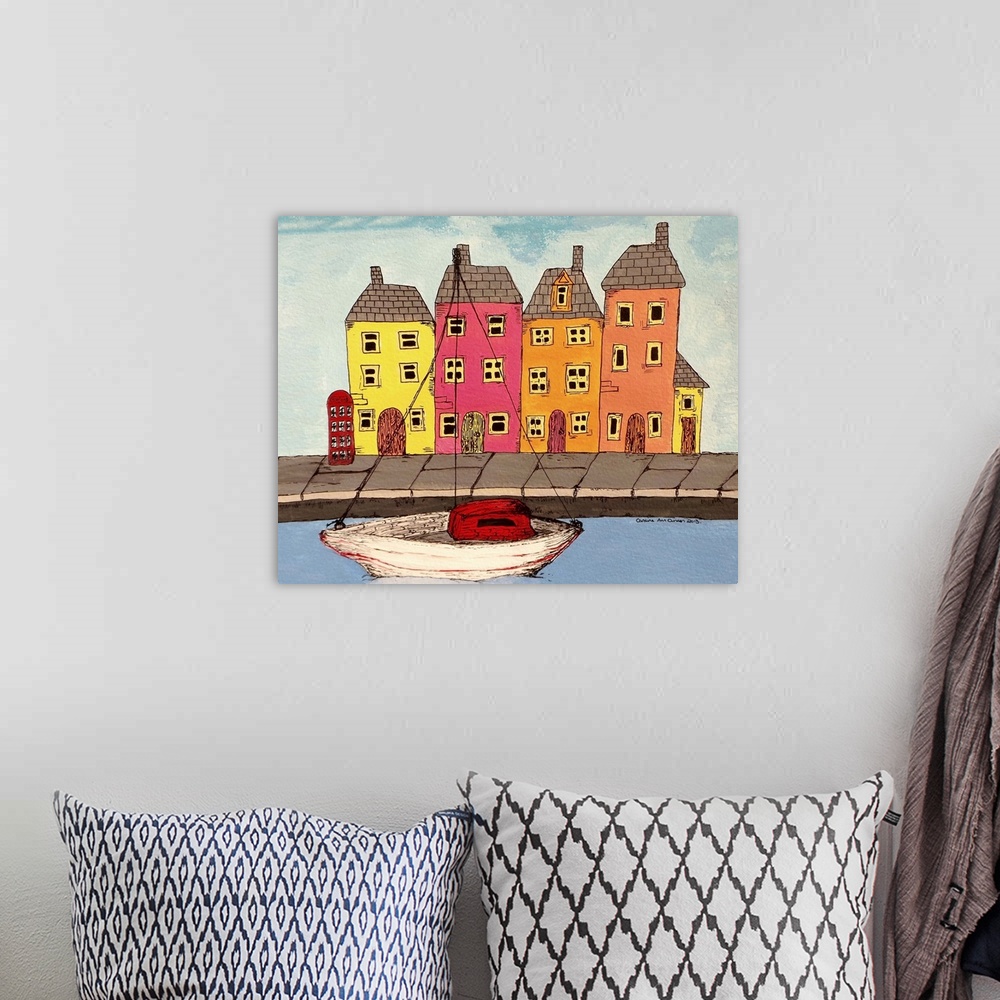 A bohemian room featuring Contemporary painting of colorful houses alongside a canal, with a boat.