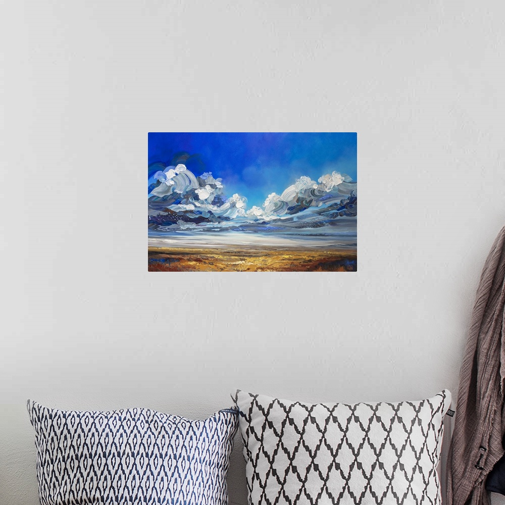 A bohemian room featuring Dramatic landscape painting of cloudy stormy sky over prairie field by contemporary Canadian Arti...