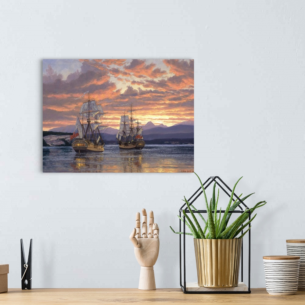 A bohemian room featuring Ships on water at sunset.