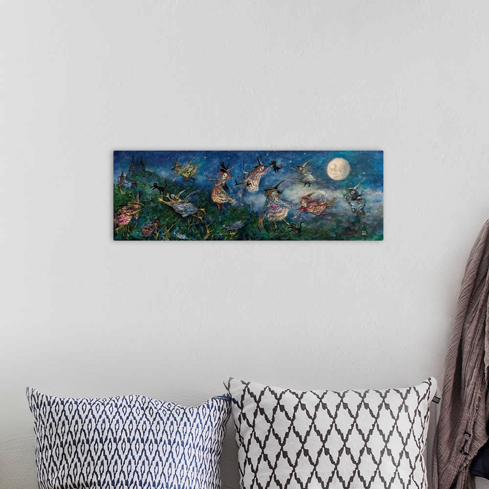 A bohemian room featuring Painting of cats in the night.