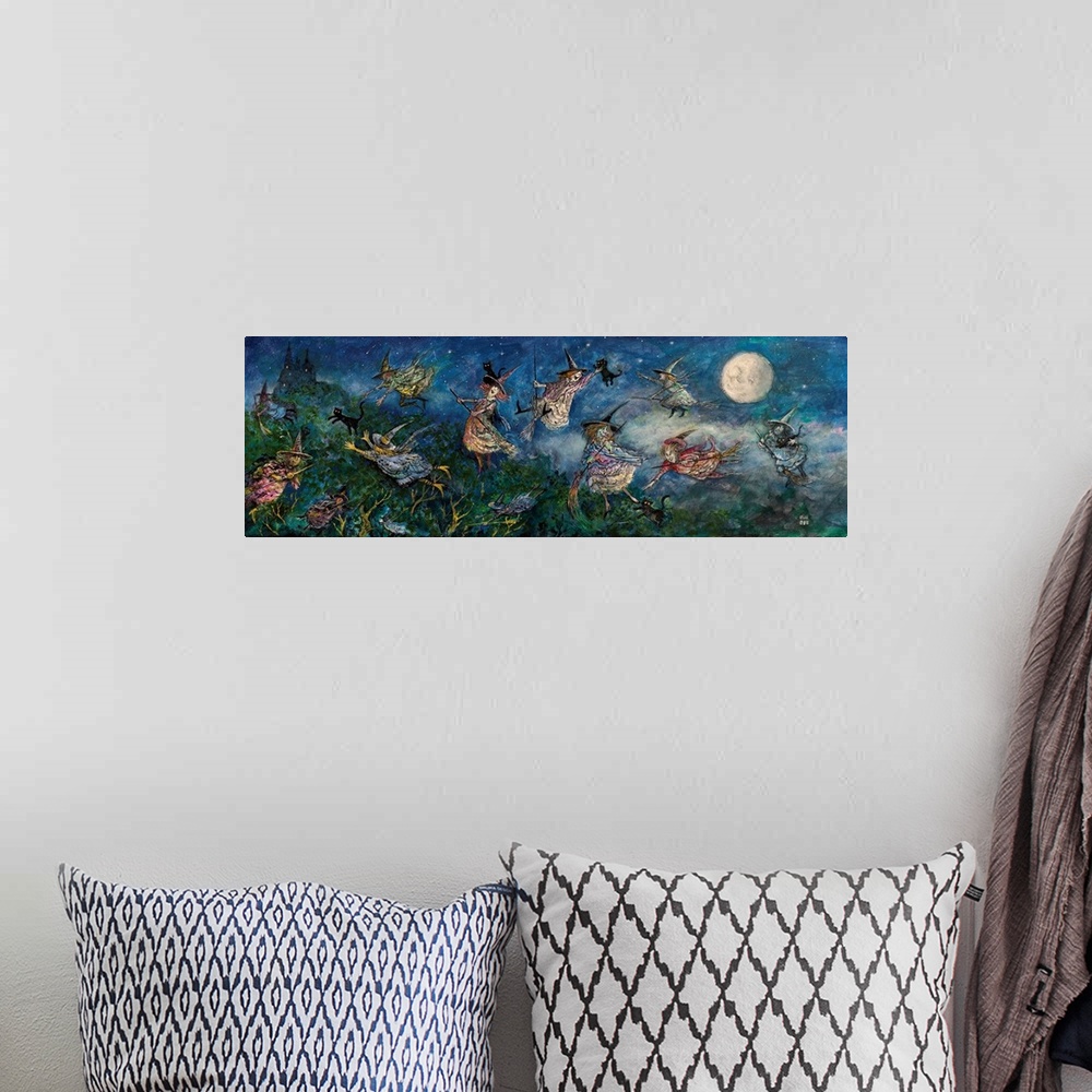 A bohemian room featuring Painting of cats in the night.