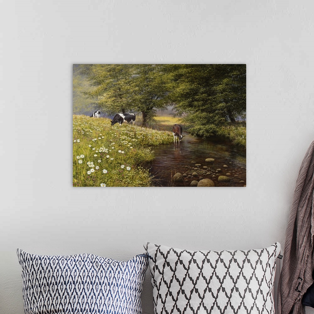 A bohemian room featuring Cows in field of daisies and drinking at the stream.