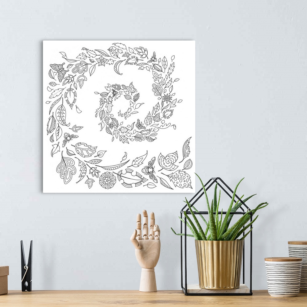 A bohemian room featuring Black and white line art of leaves and flowers blowing around to create a spiral.
