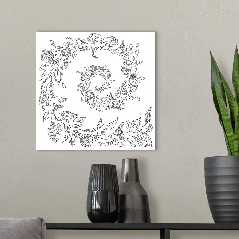 A modern room featuring Black and white line art of leaves and flowers blowing around to create a spiral.