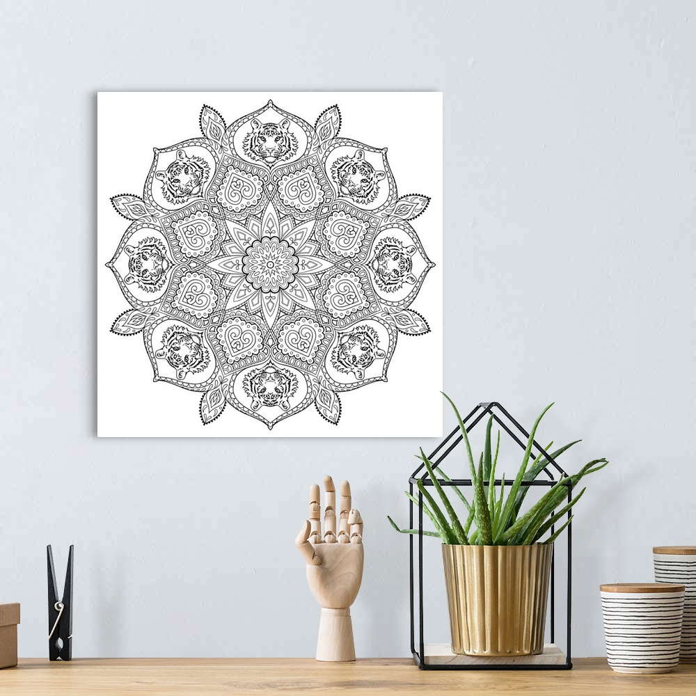 A bohemian room featuring Black and white line art of an intricately designed mandala with tigers on each point.