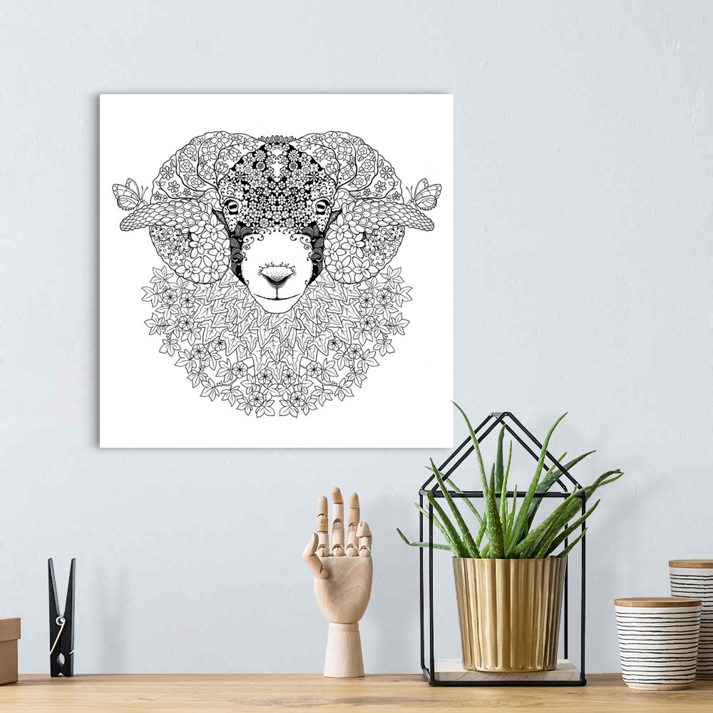 A bohemian room featuring Black and white line art of an intricately designed ram made of flowers and surrounded by flowers.