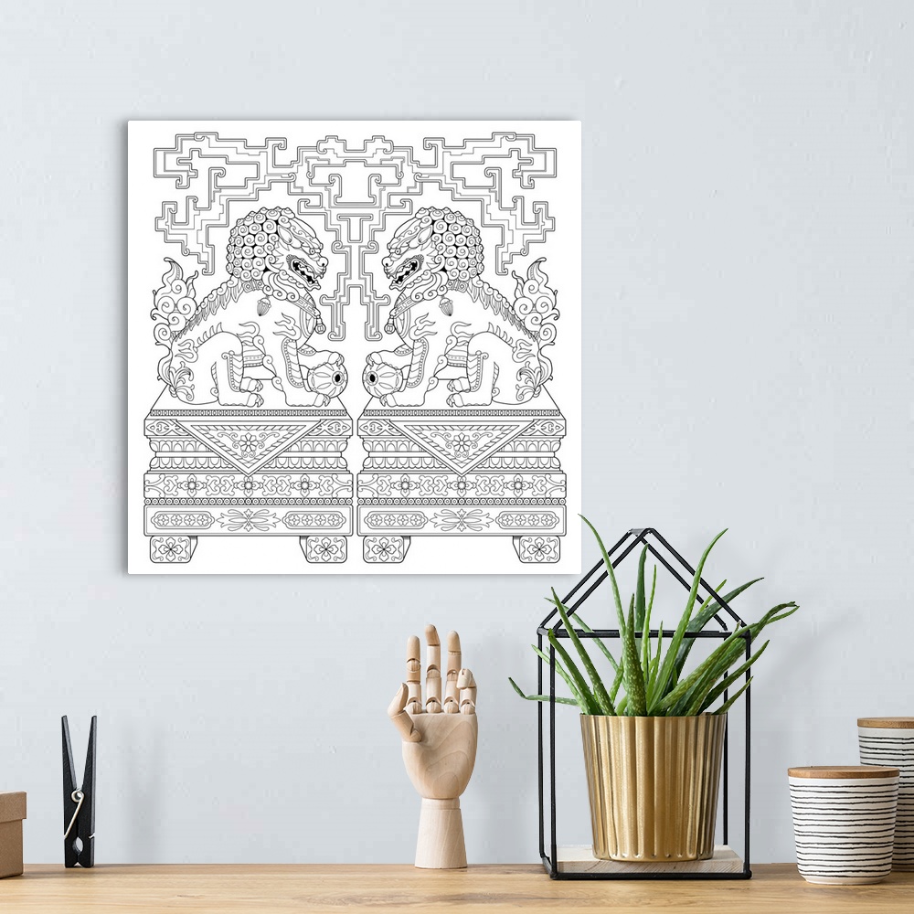 A bohemian room featuring Black and white line art with two Chinese imperial guardians looking at each other.