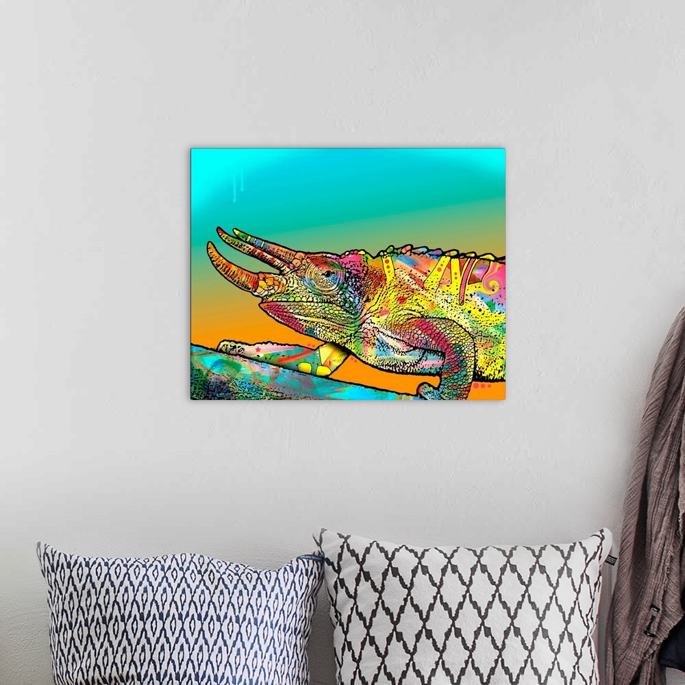 A bohemian room featuring Colorful illustration of a chameleon walking up a branch on a blue and orange background.