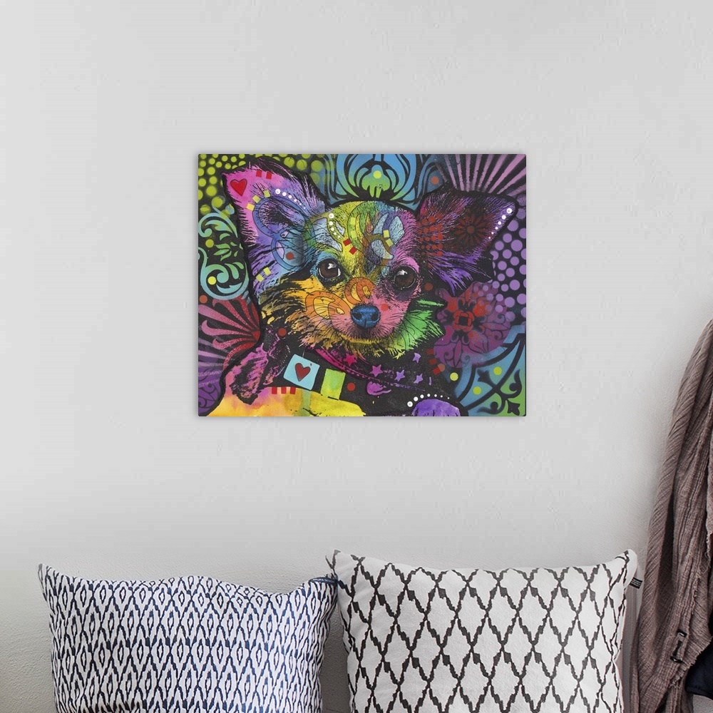 A bohemian room featuring Pop art style painting of a small dog with large ears in various colors.