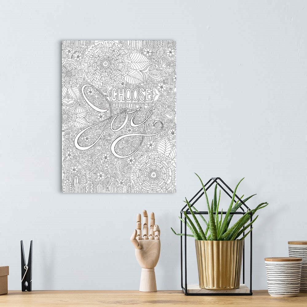 A bohemian room featuring Black and white line art with the phrase "Choose Joy" written on top of an intricately designed f...