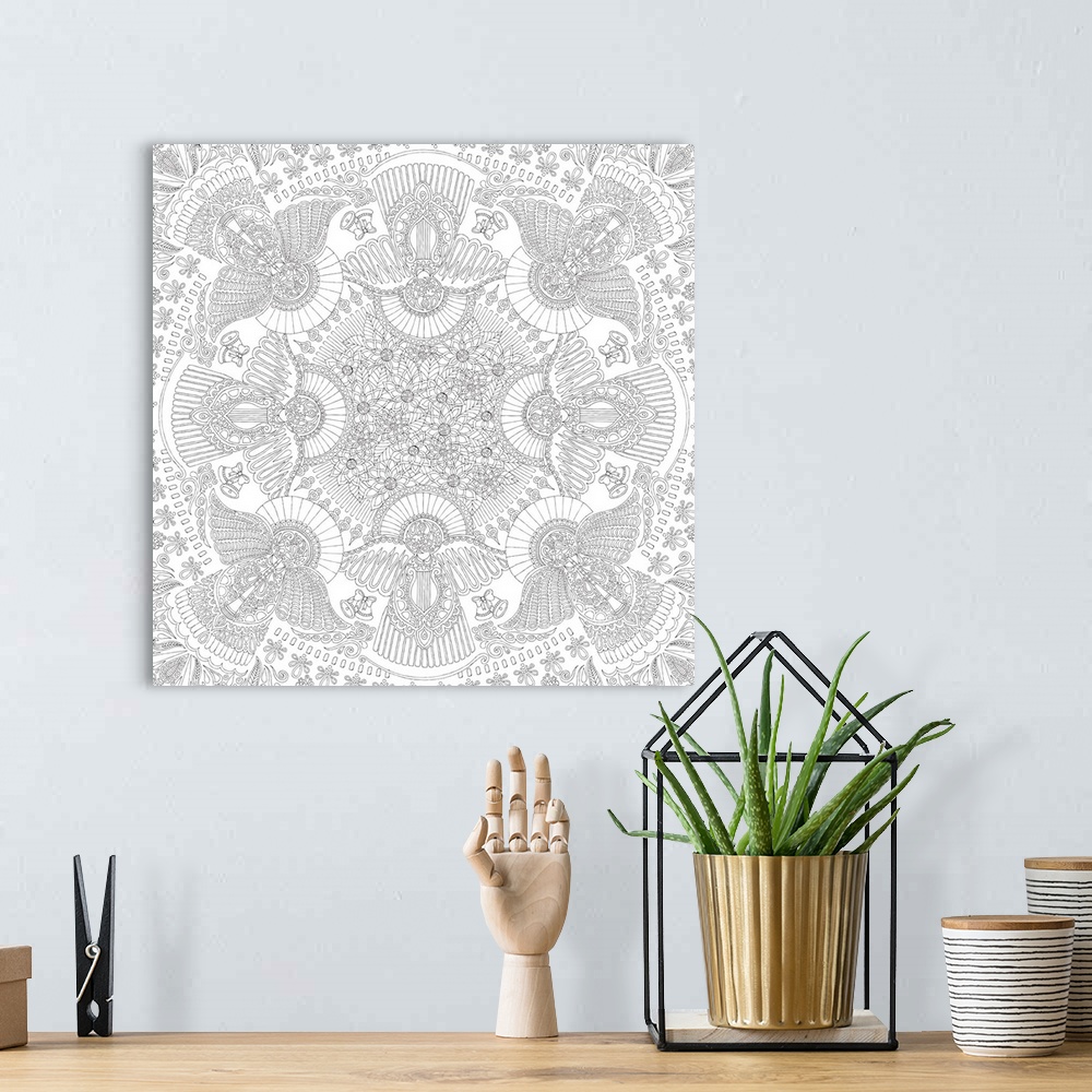 A bohemian room featuring Black and white line art of a mandala made out of intricately designed Christmas Angels and flowers.